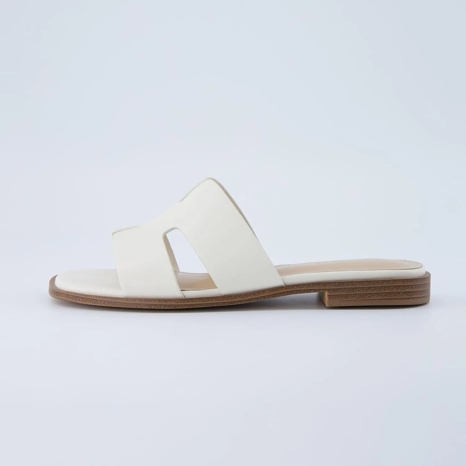 CUSHIONAIRE Voyage Cutout Strap Slides for Women, Slip On Summer Flats, Trendy Footwear, Comfortable Vacation Style Sandals for Women 2025